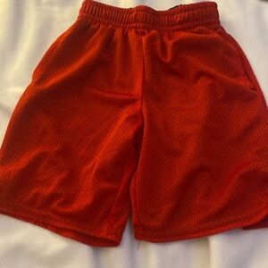 Red athletic mesh shorts very stretchy